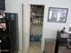 Kitchen with pantry closet showing shelves with clear storage containers and water jugs at 1941 S Pierpont Dr # 1025, Mesa, AZ 85206