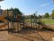 Well-maintained playground with multiple slides and climbing structures at 1941 S Pierpont Dr # 1025, Mesa, AZ 85206