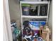 Storage shelves in a closet with a hot water tank and household items at 1941 S Pierpont Dr # 1025, Mesa, AZ 85206