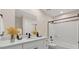 Bathroom featuring a combination shower and tub, and a neutral color palette at 3747 E Harmony Ave, Mesa, AZ 85206