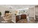 Spacious kitchen features a large island with seating and stainless steel appliances with open floorplan at 3747 E Harmony Ave, Mesa, AZ 85206