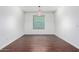 Bright dining room with tile flooring and a modern chandelier at 4059 E Mesquite St, Gilbert, AZ 85296