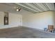 Spacious two car garage with painted walls and concrete floor at 4059 E Mesquite St, Gilbert, AZ 85296