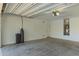 Spacious two car garage with painted walls and concrete floor at 4059 E Mesquite St, Gilbert, AZ 85296