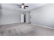 Expansive main bedroom with neutral carpet leading into a luxurious en-suite bathroom at 4059 E Mesquite St, Gilbert, AZ 85296