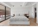 Contemporary bedroom featuring a king-sized bed, side tables, and large windows at 7157 E Rancho Vista Dr # 4001, Scottsdale, AZ 85251