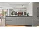 Contemporary kitchen featuring sleek island, integrated sink, and plenty of counter space, with light wood flooring at 7157 E Rancho Vista Dr # 4001, Scottsdale, AZ 85251