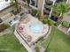 An aerial shot of the community hot tub surrounded by lounge chairs and landscaping at 7625 E Camelback Rd # A108, Scottsdale, AZ 85251