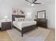 Cozy bedroom with a large bed, soft lighting and tasteful decor at 7625 E Camelback Rd # A108, Scottsdale, AZ 85251