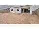 A large backyard with a covered patio presents a blank canvas for outdoor living at 1246 E Penedes Dr, Gilbert, AZ 85298