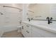 Bright primary bathroom featuring double sink vanity, luxury fixtures, and bathtub at 1246 E Penedes Dr, Gilbert, AZ 85298