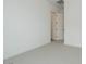 Bright bedroom featuring neutral carpet, ensuite bathroom, and walk in closet at 1246 E Penedes Dr, Gilbert, AZ 85298