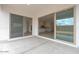 A covered patio boasts oversized sliding doors with views of the home's interior and backyard at 1246 E Penedes Dr, Gilbert, AZ 85298