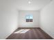 Cozy bedroom featuring neutral carpet, natural light, and a serene atmosphere for restful nights at 626 W Pintail Dr, Casa Grande, AZ 85122