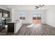 Bright kitchen with a large island, stainless appliances, and a seamless transition to the backyard through sliding glass doors at 626 W Pintail Dr, Casa Grande, AZ 85122