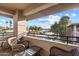 Enjoy the fresh air on this balcony with beautiful outdoor furniture, providing a relaxing spot with neighborhood views at 7009 E Acoma, Lot #2060 Dr # 2060, Scottsdale, AZ 85254