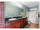 Well-lit bathroom with double sinks, a large mirror, and a shower-tub combination at 7009 E Acoma, Lot #2060 Dr # 2060, Scottsdale, AZ 85254