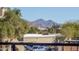 Picturesque mountain views visible beyond the building tops and palm trees at 7009 E Acoma, Lot #2060 Dr # 2060, Scottsdale, AZ 85254