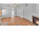 Bright living room features a fireplace, wood floors, and fresh white walls at 842 W Saragosa St, Chandler, AZ 85225