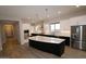 Spacious kitchen with large island, stainless steel appliances, and modern finishes at 1956 W Rowel Rd, Phoenix, AZ 85085