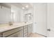 Bathroom featuring dual sinks, modern fixtures, and ample counter space at 26995 W Adam Ave, Buckeye, AZ 85396