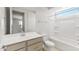 Well-lit bathroom showcasing a single vanity with a neutral countertop, a toilet, and a tub-shower combo at 26995 W Adam Ave, Buckeye, AZ 85396