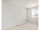 Bright, airy room with neutral walls, plush carpeting, and a large window offering natural light at 26995 W Adam Ave, Buckeye, AZ 85396