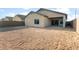 A spacious backyard with a covered patio, perfect for outdoor entertaining and relaxation at 6247 W Georgetown Way, Florence, AZ 85132