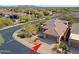 Aerial view of a well-maintained home with desert landscaping and tile roof at 6827 E Eagle Feather Rd, Scottsdale, AZ 85266