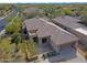 Aerial view of a home showcasing the roof and desert landscaping in a neighborhood at 6827 E Eagle Feather Rd, Scottsdale, AZ 85266