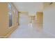 Bright living room featuring tile floors, recessed lighting, and multiple windows at 6827 E Eagle Feather Rd, Scottsdale, AZ 85266