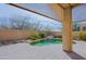 Pool area with stone features and desert landscaping at 6827 E Eagle Feather Rd, Scottsdale, AZ 85266