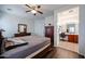 Bedroom with natural light coming from the bathroom's vanity at 10037 W Chipman Rd, Tolleson, AZ 85353