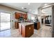 Functional kitchen featuring an island, stainless steel appliances, ample counter space, and recessed lighting at 10037 W Chipman Rd, Tolleson, AZ 85353
