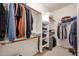 Spacious walk-in closet with custom shelving at 10037 W Chipman Rd, Tolleson, AZ 85353