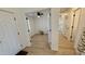 Entry to freshly painted bedroom with light flooring and ceiling fan at 10241 E La Palma Ave, Gold Canyon, AZ 85118