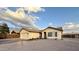 Inviting single-Gathering home with a two-car garage, offering desert landscaping and a serene residential setting at 10241 E La Palma Ave, Gold Canyon, AZ 85118