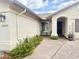 Inviting front entrance with neutral colors and desert landscaping at 10241 E La Palma Ave, Gold Canyon, AZ 85118