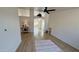Bright living room features light wood floors, neutral walls, and an open floor plan at 10241 E La Palma Ave, Gold Canyon, AZ 85118