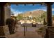Inviting entrance with stone walkway and desert landscaping, showcasing the beautiful mountain views at 10596 E Yearling Dr, Scottsdale, AZ 85255