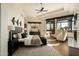 Luxe bedroom with a sitting area, custom fixtures, and a private balcony for relaxing at 10596 E Yearling Dr, Scottsdale, AZ 85255