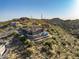 Stunning aerial view of an estate home on a hillside with a private pool and desert landscaping at 11320 N Crestview Dr, Fountain Hills, AZ 85268