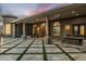 An elegant covered patio with a seating area and an outdoor kitchen, perfect for entertaining guests at 11320 N Crestview Dr, Fountain Hills, AZ 85268
