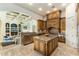 Spacious kitchen with custom wood cabinetry, granite countertops, stainless steel appliances and coffered ceilings at 11320 N Crestview Dr, Fountain Hills, AZ 85268