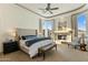 Luxurious main bedroom suite with fireplace, scenic views, ceiling fan, and neutral color palette at 11320 N Crestview Dr, Fountain Hills, AZ 85268