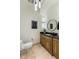 Elegant powder room featuring a modern sink and fixtures at 11320 N Crestview Dr, Fountain Hills, AZ 85268