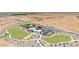 A beautiful aerial view of a community amenity center with pool, grassy areas, playgrounds, and picnic areas at 11959 E Aster Ln, Florence, AZ 85132