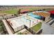 Community pool area featuring multiple pools, seating, and recreational spaces for residents at 11959 E Aster Ln, Florence, AZ 85132