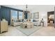 Bright and airy living room with modern decor, comfortable seating, and ample natural light at 11959 E Aster Ln, Florence, AZ 85132
