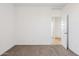 Bedroom with neutral carpet and open door leading into another room at 12456 E Bahia Ct, Florence, AZ 85132
